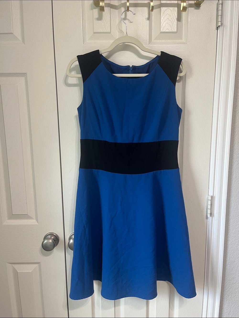 Sleeveless Blue Fit-and-Flare Dress with Black Accents